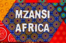 An image of South African Shwe Shwe fabric with the slang word Mzansi and Africa on