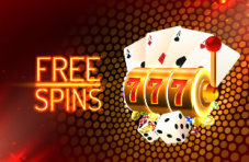 A slot barrel with triple 7s and the words free spins on dotted red background