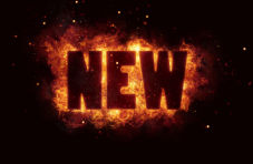 An illustration of the word “NEW” traced out of a ball of fire against a dark background