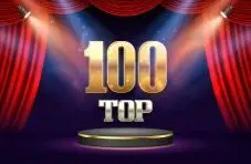 An illustration of gold "TOP 100" text above a black podium, spotlit on a stage with red curtains