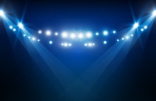 An illustration of bright stadium arena lights at night in shades of blue against a dark background 