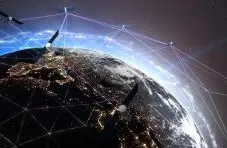 A digital illustration of satellites orbiting Earth at night with glowing network connection lines on a dark space background