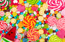 A photo of colourful candy and lollipops
