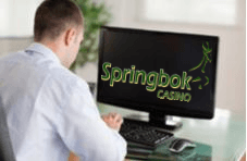 computer screen with Springbok logo on it