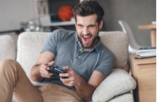 a guy having fun playing a video game