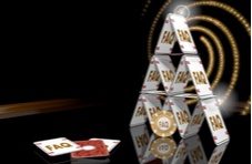 An illustration of a house of cards and a casino chip with FAQ on them in gold against a dark background