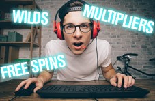 gamer with a perplexed look on the face with words like ‘Wilds’ ‘Free Spins’ ‘Multipliers’ whirling around his head