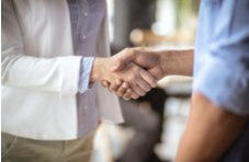 two people shaking hands