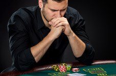 Poker player studying diligently