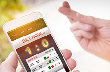 Sports bettor crossing his fingers